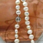 White Freshwater Button Shape Pearl Necklace finished with a Double Sided Sterling Silver Clasp