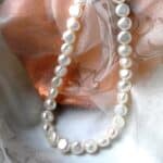 White Freshwater Button Shape Pearl Necklace finished with a Double Sided Sterling Silver Clasp