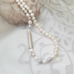 Aine - Subtle asymmetrical Freshwater Pearl Necklace designed with Dove Grey & White Freshwater Pearls & brushed Sterling Silver feature link by Pearl Perfect.