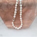 Aine - Subtle asymmetrical Freshwater Pearl Necklace designed with Dove Grey & White Freshwater Pearls & brushed Sterling Silver feature link by Pearl Perfect.