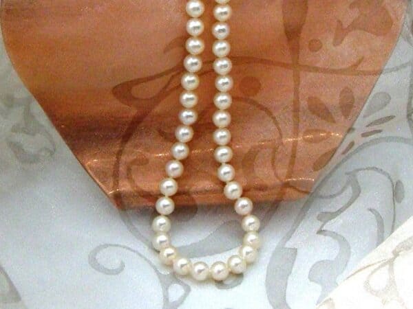 White Cultured Freshwater Pearl Necklace finished with a Sterling Silver Trigger Clasp.