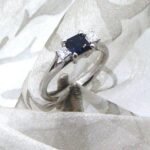 Stylish Sapphire Diamond Ring set with square cut sapphire & princess cut diamonds with sweep shoulder detail.  Beth Blue was custom made in 18ct white gold ~ Sapphire Weight - 0.70 carat ~ Diamond Weight- 0.15 carat.   Sapphire is a pretty mid/dark blue with light colour flashes ~ CAD renders show detail of design.     