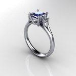 Stylish Sapphire Diamond Ring set with square cut sapphire & princess cut diamonds with sweep shoulder detail.  Beth Blue was custom made in 18ct white gold ~ Sapphire Weight - 0.70 carat ~ Diamond Weight- 0.15 carat.   Sapphire is a pretty mid/dark blue with light colour flashes ~ CAD renders show detail of design.     