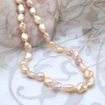 Subtle Freshwater Pearl Necklace featuring naturally coloured Keshi Pearls in shades of Peach, Plum and Gold by Pearl Perfect Design Room.