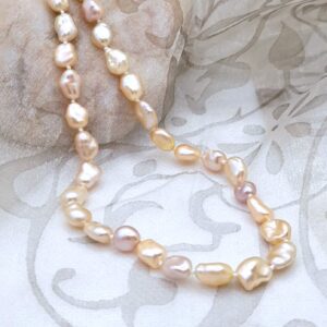 Subtle Freshwater Pearl Necklace featuring naturally coloured Keshi Pearls in shades of Peach, Plum and Gold by Pearl Perfect Design Room.