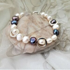 Contemporary Freshwater Pearl Bracelet designed with a pattern of White & Peacock Freshwater pearls & Sterling Silver elements framing selected pearls by Pearl Perfect.