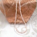 Chic Button Freshwater Pearl Necklace, cross drilled, in delicate shades of peach and plum by Pearl Perfect Design Room.