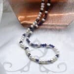 Delicate Freshwater Pearl Necklace designed with faceted Iolite Crystal beads and Button White Freshwater Pearls by Pearl Perfect Design Room.