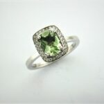 Korinne Bespoke Gemstone Ring set with Green Beryl & Diamonds in 18ct White Gold as a unique & subtle engagement ring.