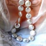 Freshwater Button shape Pearl Necklace fitted with a Sterling Silver feature bolt ring to compliment shape of the pearls