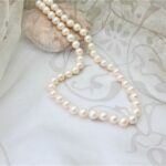 Classic Freshwater Pearl Necklace the white potato shaped Pearls are complemented with a double sided 9ct Yellow & White Gold clasp