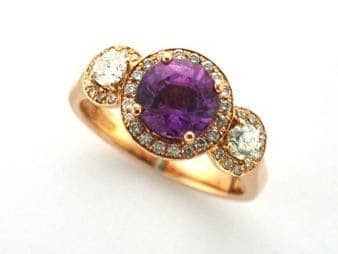 Unique Engagement Ring Designed to showcase this fabulous Purple Sapphire set in Triple Halo Design. Viola was custom Made in 18ct Rose Gold with Brilliant Cut Diamonds & pretty pierced basket setting,