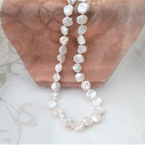 Pretty Freshwater Pearl Necklace showcasing the varied shapes of non-nucleated pearls, typically called Keshi, which give a lovely lacy effect when worn.