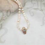 Delicate Freshwater Pearl Necklace with 9ct Yellow Gold Pendant set with Blue Topaz by Pearl Perfect. 