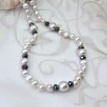 Subtle Freshwater Pearl Necklace designed with a mix of silver grey freshwater pearls and faceted hematite beads by Pearl Perfect.