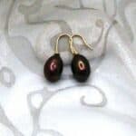 Graceful Freshwater Pearl Drop Earrings, the rich bronze chocolate colour Pearls measure 9x13mm fittings and rondelles are in 9ct. Yellow Gold