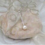 Delicate Alumette shape Pearl Pendant in 9ct white gold bar with pave set Diamonds and Cultured Pearl worn on Venetian box link chain.