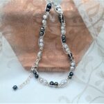 Quirky Freshwater Pearl Necklace with Grey & White Freshwater Pearls designed within Sterling Silver links by Pearl Perfect.